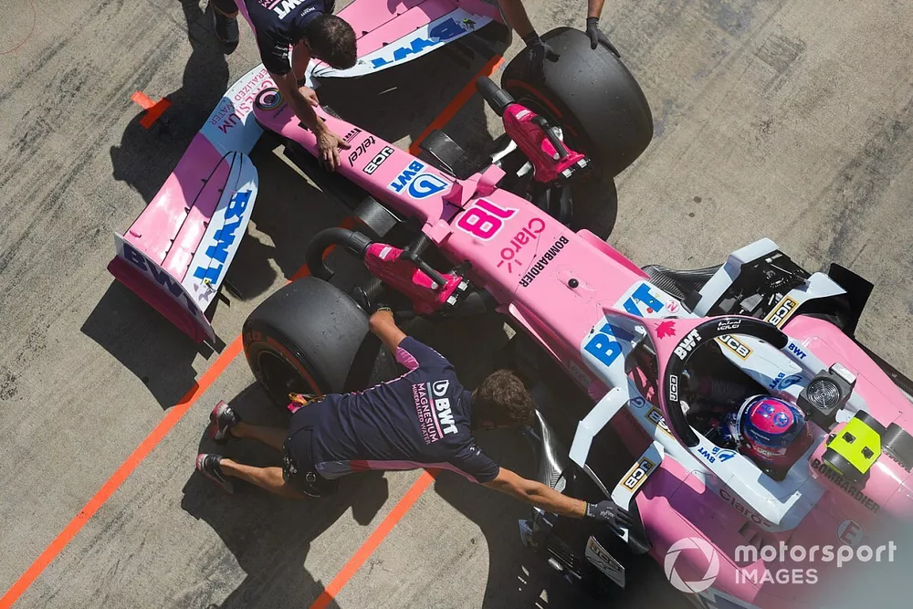 Lance Stroll, Racing Point RP20, is returned to the garage