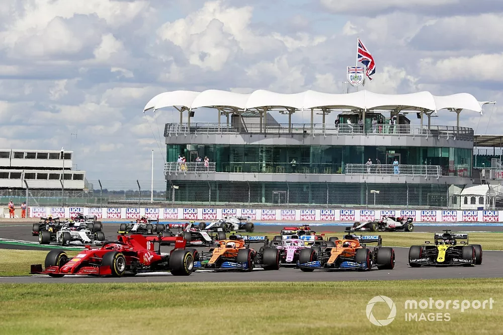 Charles Leclerc, Ferrari SF1000, Lando Norris, McLaren MCL35 and Carlos Sainz Jr., McLaren MCL35 at the start of the race
