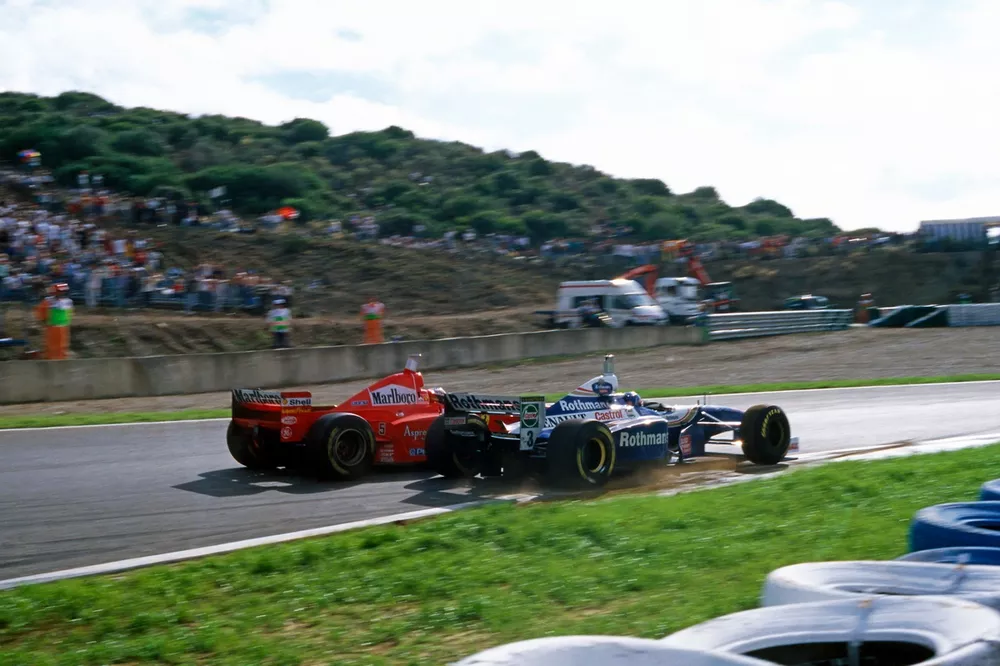 Michael Schumacher, Ferrari F310B, Jacques Villeneuve, Williams FW19 Renault