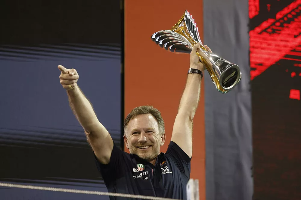 Christian Horner, Team Principal, Red Bull Racing, lifts the Constructors trophy on the podium