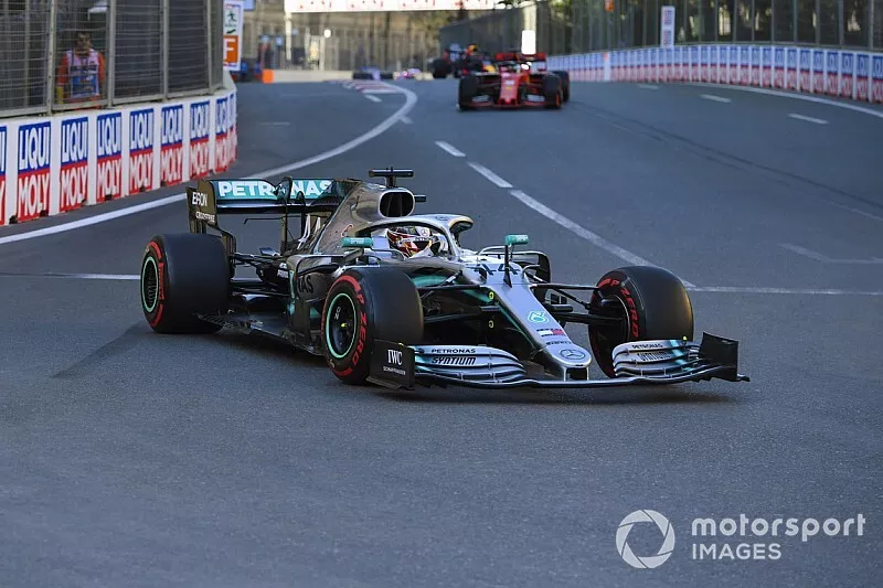 Lewis Hamilton, Mercedes AMG F1 W10, leads Sebastian Vettel, Ferrari SF90