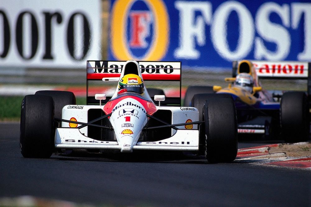 Ayrton Senna, McLaren MP4-6 Honda, leads Nigel Mansell, Williams FW14 Renault