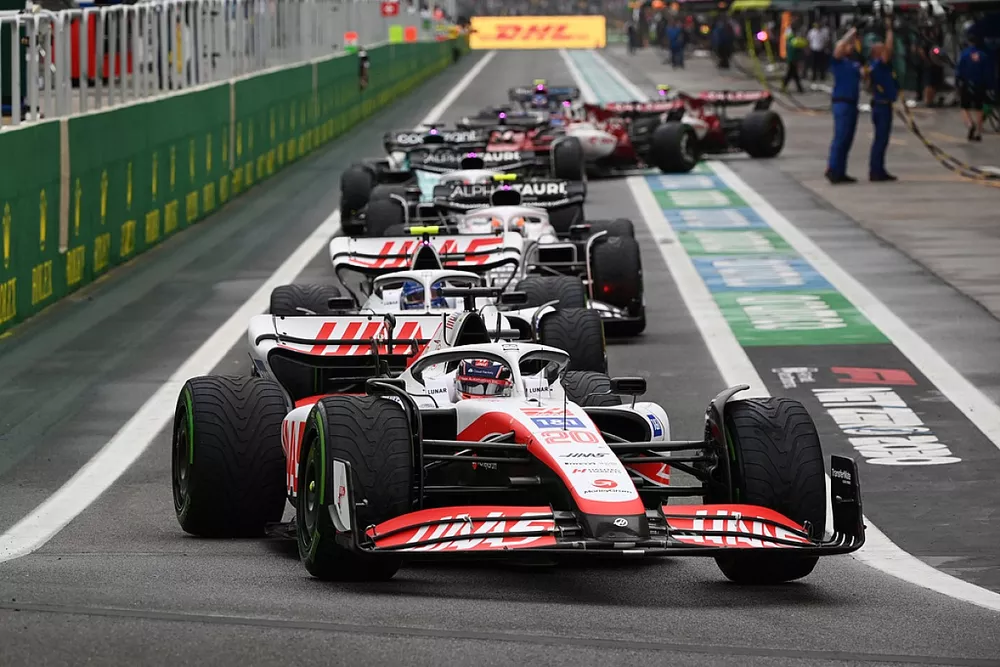 Kevin Magnussen, Haas VF-22, Mick Schumacher, Haas VF-22, out of the pits
