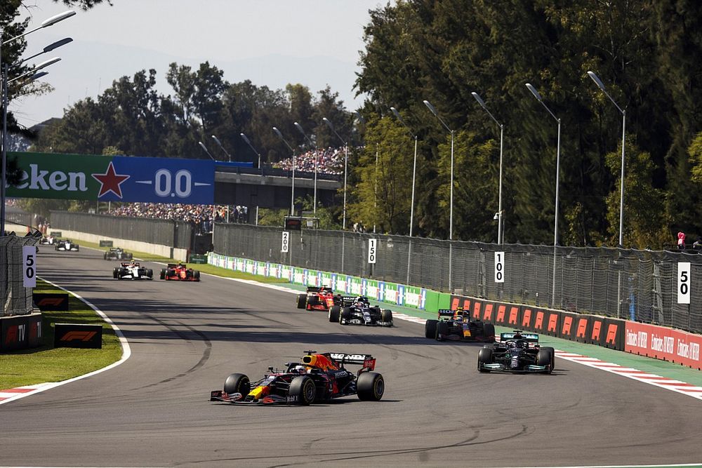 Max Verstappen, Red Bull Racing RB16B, Lewis Hamilton, Mercedes W12,and Sergio Perez, Red Bull Racing RB16B