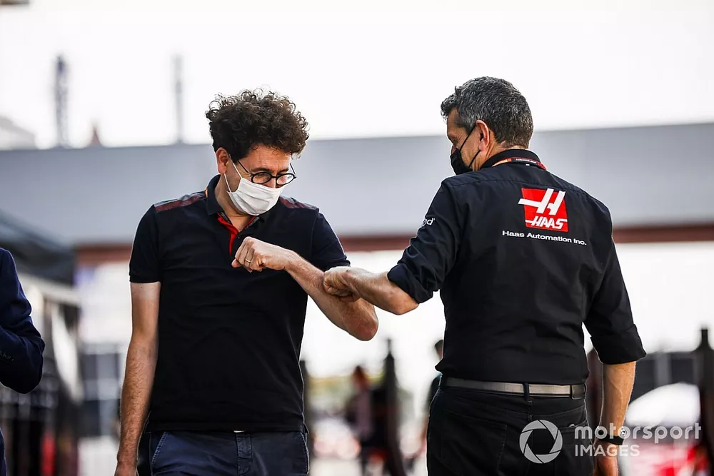 Mattia Binotto, Team Principal Ferrari and Guenther Steiner, Team Principal, Haas F1