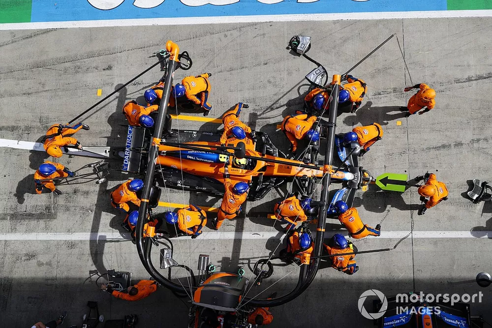 Lando Norris, McLaren MCL35M, makes a pit stop