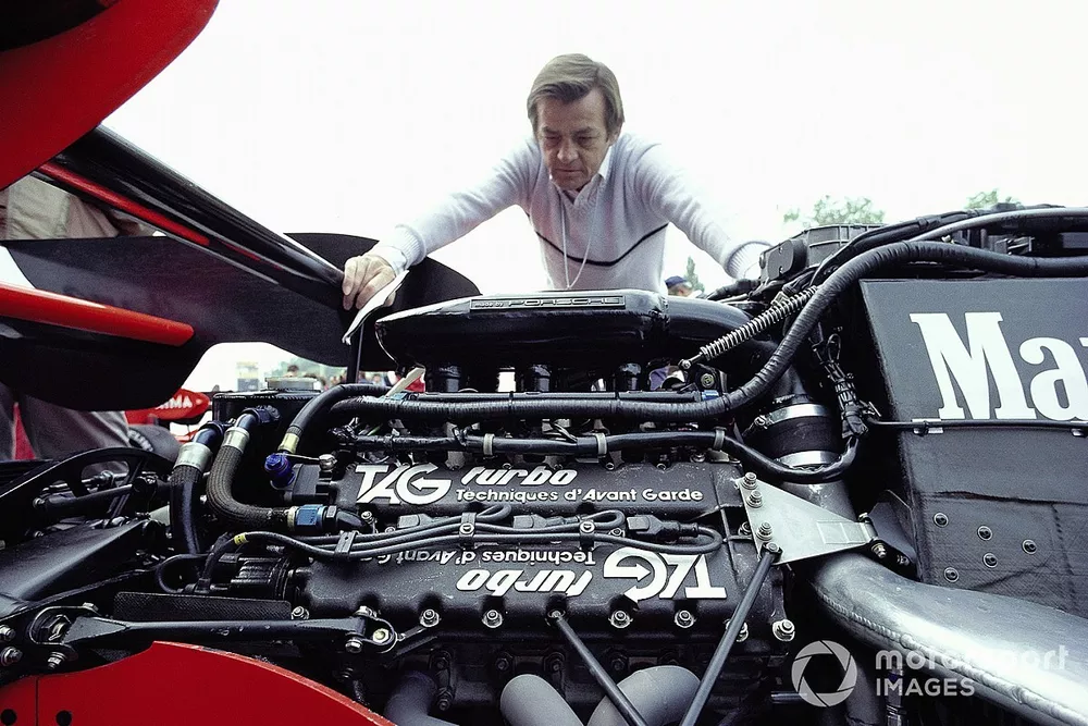 Hans Mezger inspects the Porsche TAG engine in a McLaren MP4-2