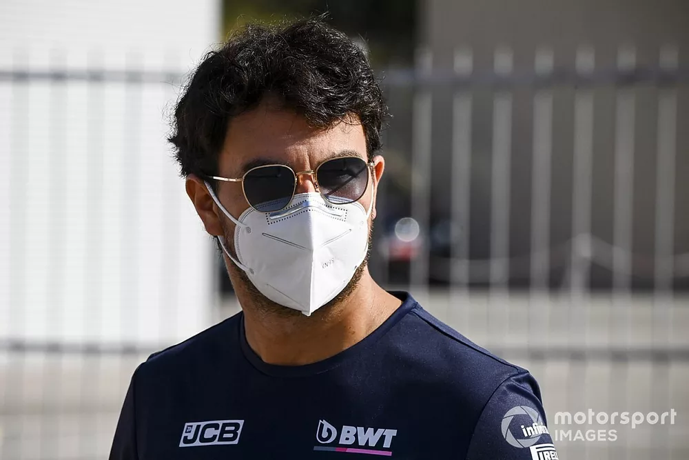 Sergio Perez, Racing Point walks into the paddock