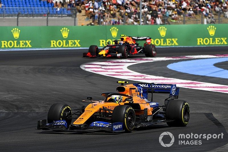 Lando Norris, McLaren MCL34, leads Pierre Gasly, Red Bull Racing RB15