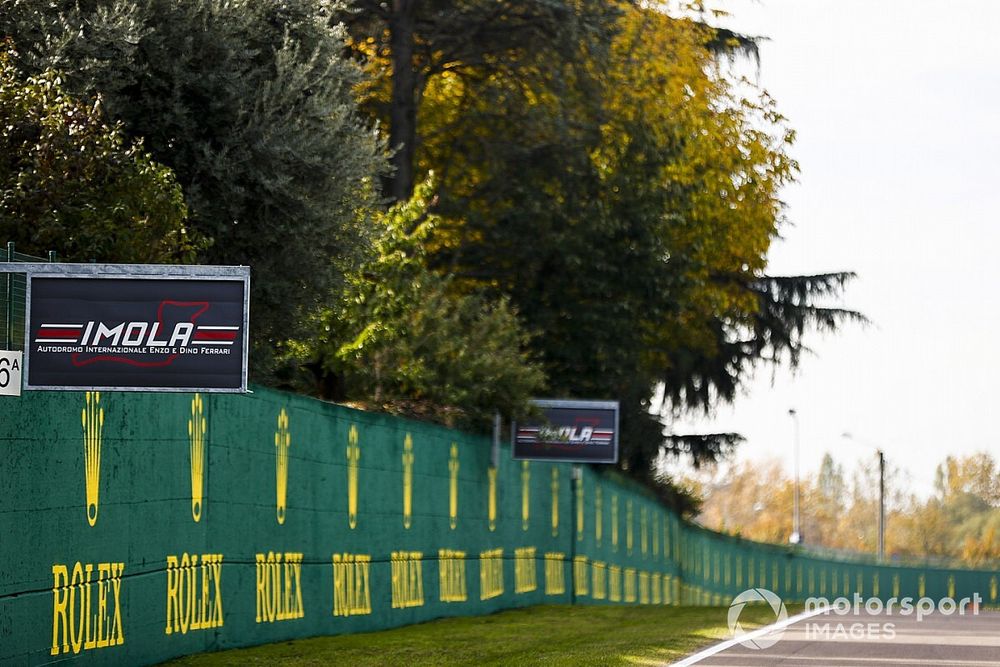 Imola and sponsor signage by the side of the track