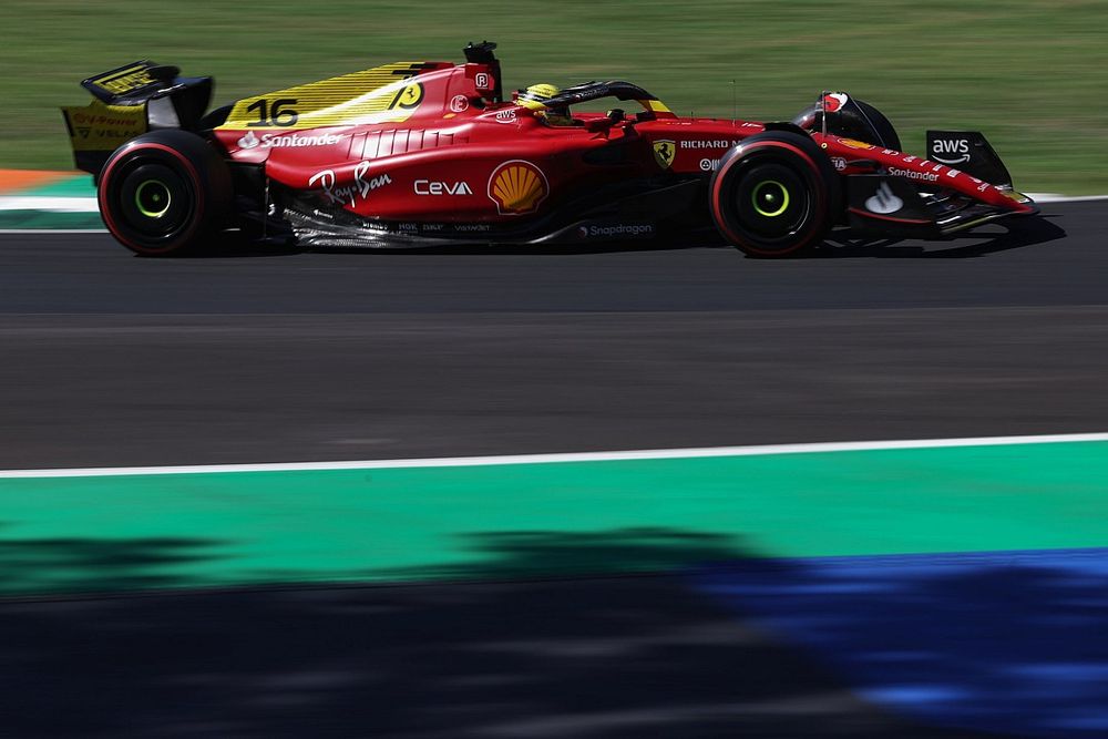 Charles Leclerc, Ferrari F1-75, heads to the grid