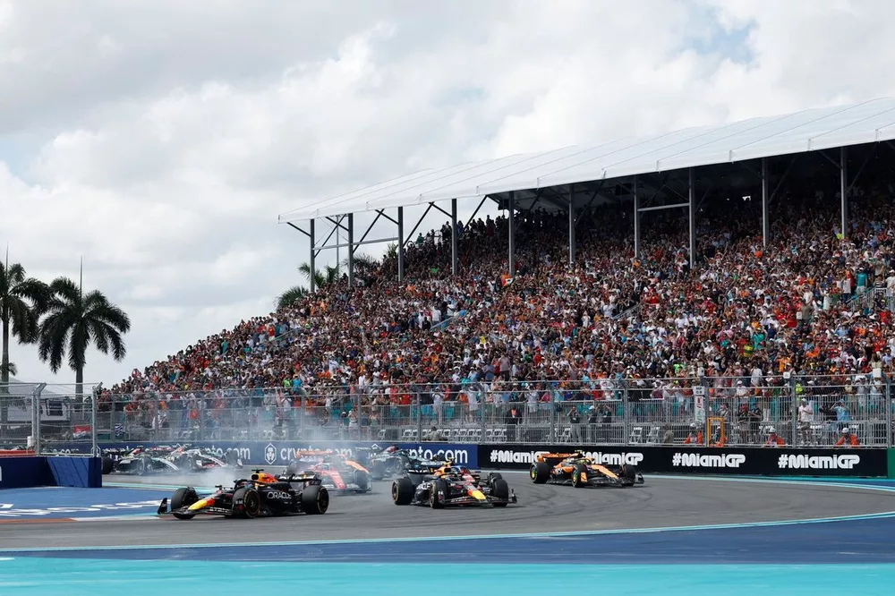 Race start - Max Verstappen, Red Bull Racing RB20 the field away, as Sergio Perez, Red Bull Racing RB20 almost crashes into him