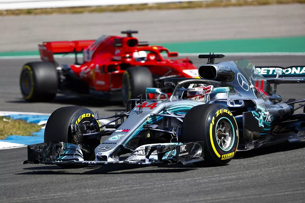 Lewis Hamilton, Mercedes AMG F1 W09, leads Sebastian Vettel, Ferrari SF71H