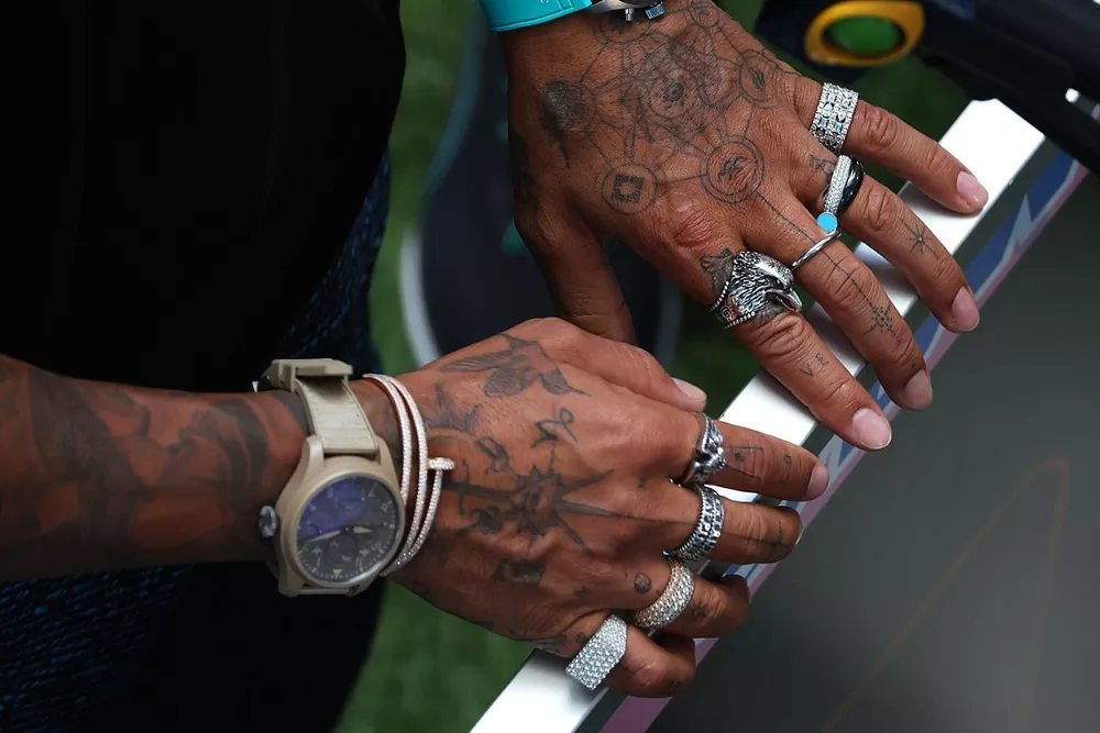 The tattoos and jewellery of Lewis Hamilton, Mercedes-AMG 