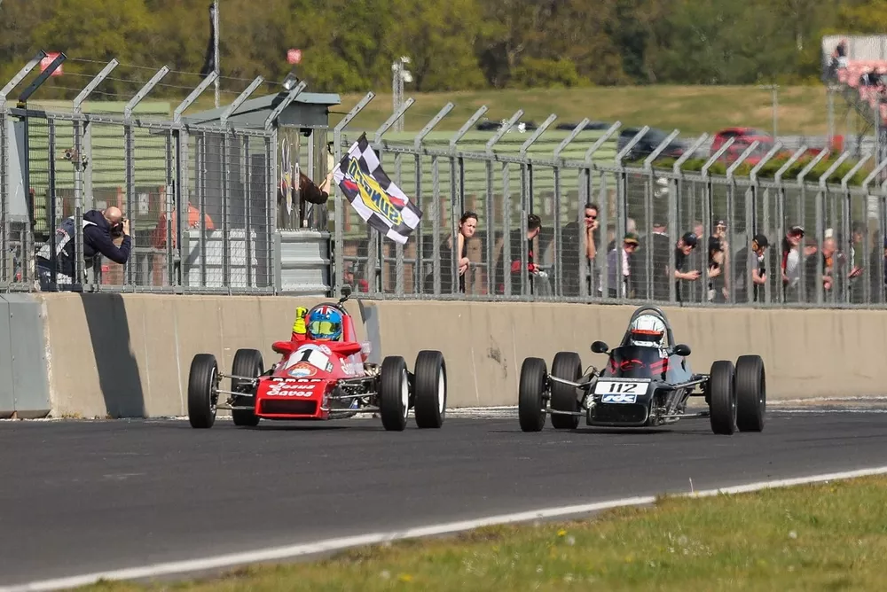 Jordan Harrison (1) pips Tom Gadd (112) to Classic Formula Ford race one win