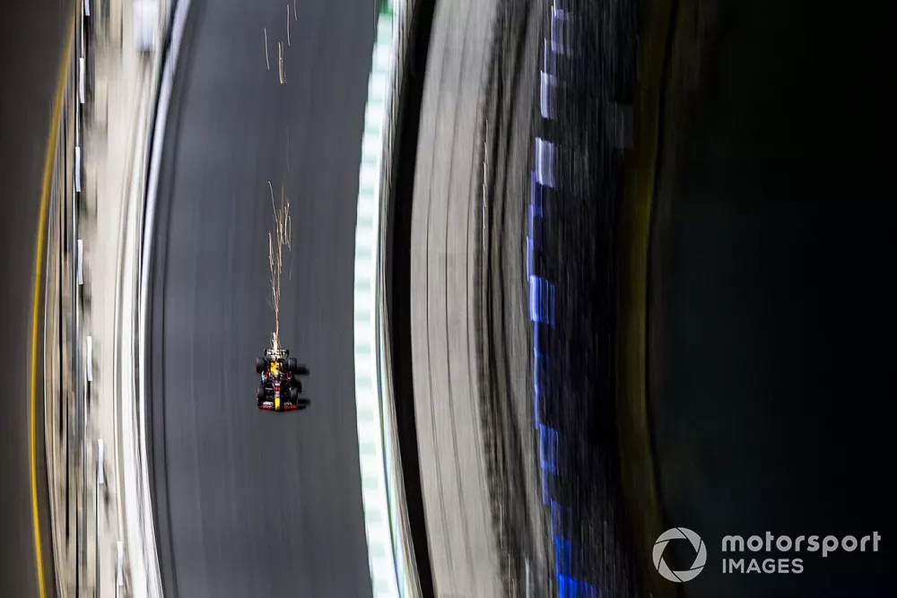 Sparks trail from Sergio Perez, Red Bull Racing RB19