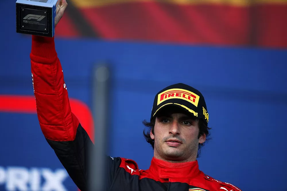 Carlos Sainz, Ferrari, 3rd position, celebrates on the podium with his trophy