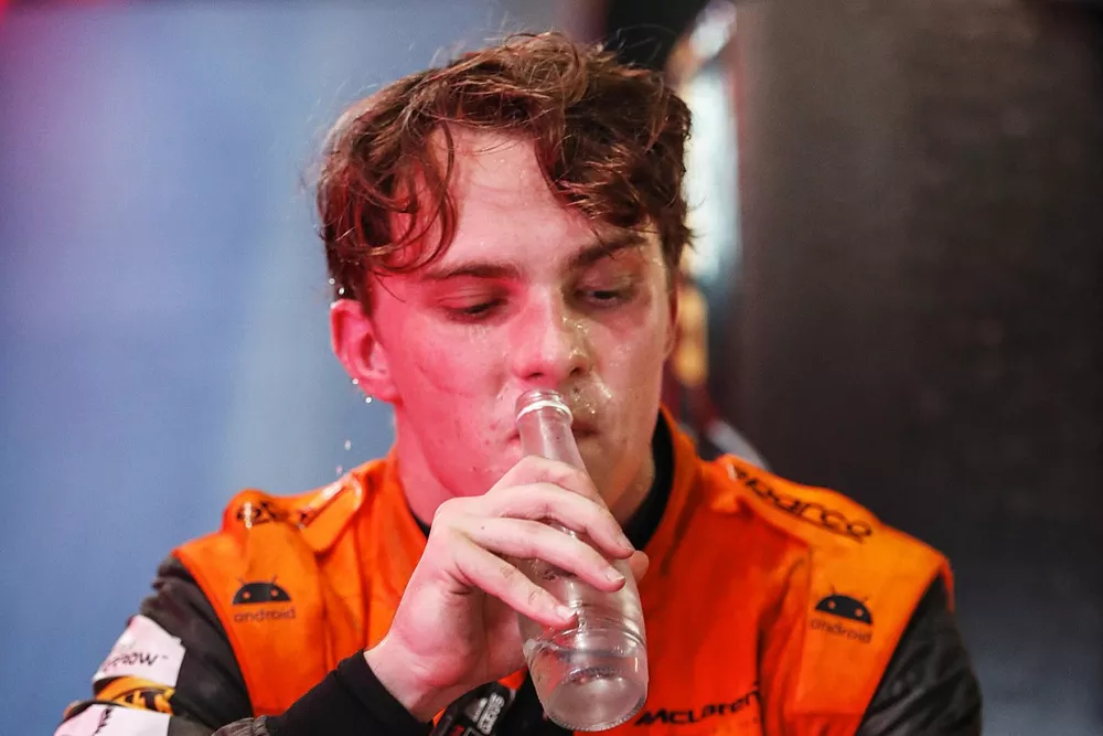 Oscar Piastri, McLaren, 2nd position, rests after the race in Parc Ferme