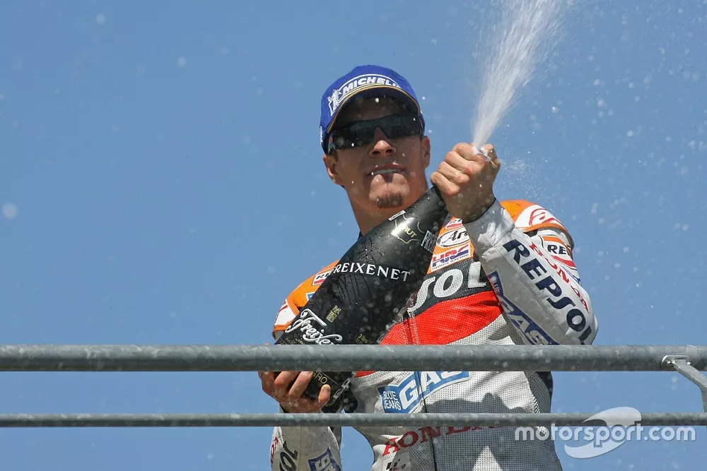 Podium: champagne for Nicky Hayden