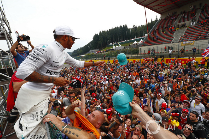 Race winner Lewis Hamilton, Mercedes AMG F1, celebrates with fans after the race