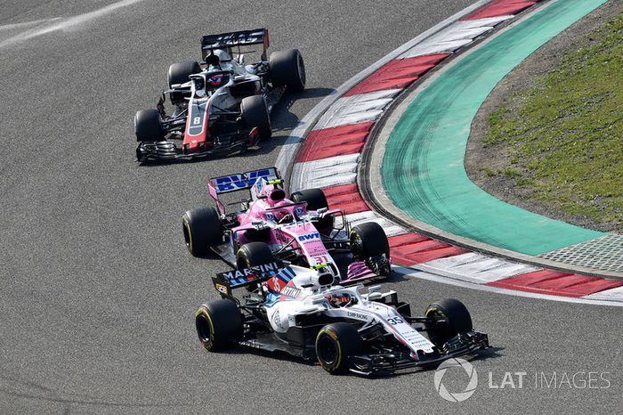 Sergey Sirotkin, Williams FW41, Esteban Ocon, Force India VJM11 and Romain Grosjean, Haas F1 Team VF-18