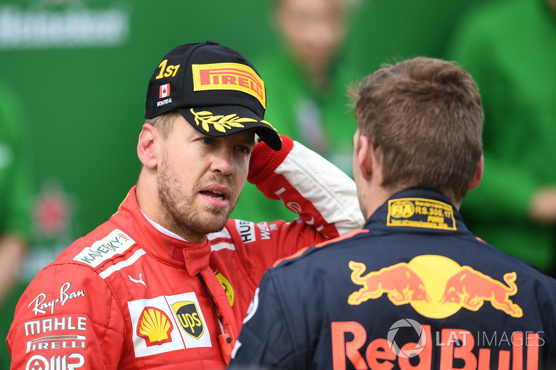 Sebastian Vettel, Ferrari and Max Verstappen, Red Bull Racing in parc ferme