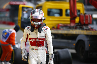 Charles Leclerc, Sauber C37, retires on the opening lap, after contact from Fernando Alonso, McLaren