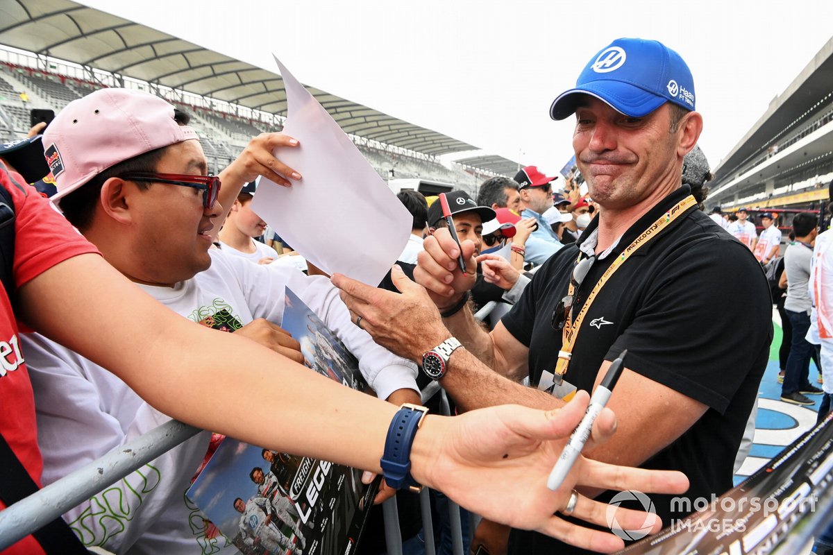 Max Papis signs autographs for fans