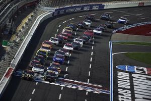 Kyle Busch, Joe Gibbs Racing, Toyota and Ross Chastain, Kaulig Racing, Chevrolet Camaro lead the field at the race start