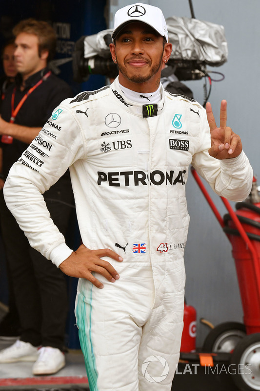 Pole sitter Lewis Hamilton, Mercedes AMG F1 celebrates in parc ferme