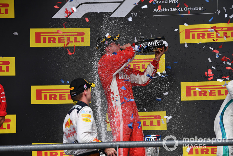 Max Verstappen, Red Bull Racing, Kimi Raikkonen, Ferrari and Lewis Hamilton, Mercedes AMG F1 celebrate on the podium with the champagne