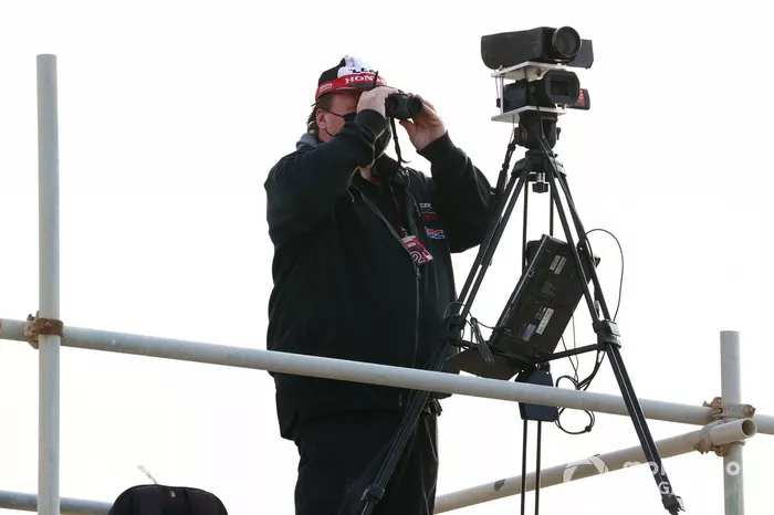 Team technicians observing with cameras