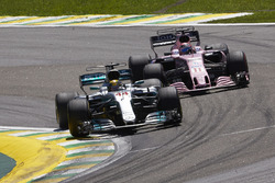 Lewis Hamilton, Mercedes AMG F1 W08, passes Sergio Perez, Sahara Force India F1 VJM10