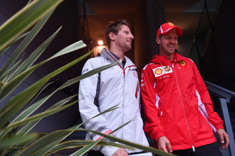 Romain Grosjean, Haas F1 Team, Sebastian Vettel, Ferrari