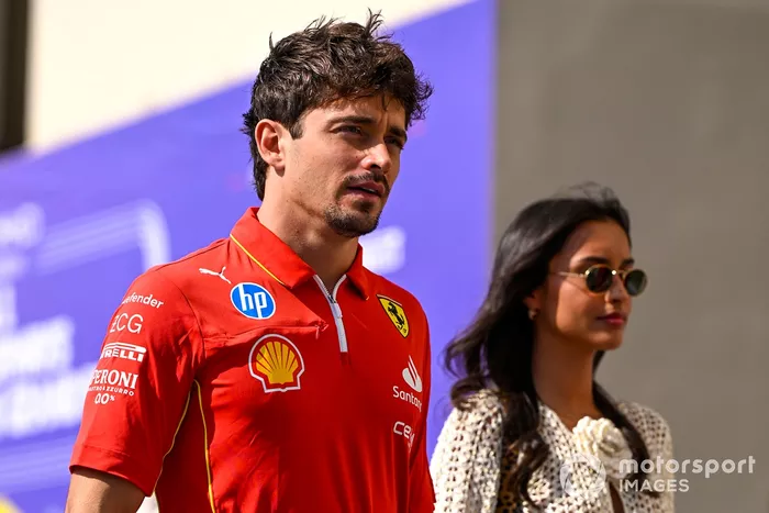 Charles Leclerc, Scuderia Ferrari, arrives in the paddock with girlfriend Alexandra Saint Mleux