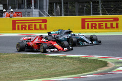 Sebastian Vettel, Ferrari SF70H and Valtteri Bottas, Mercedes-Benz F1 W08 battle for position