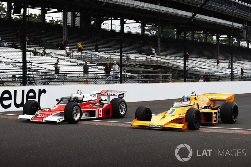 Johnny Rutherford, McLaren M16, and Mario Andretti, McLaren M24