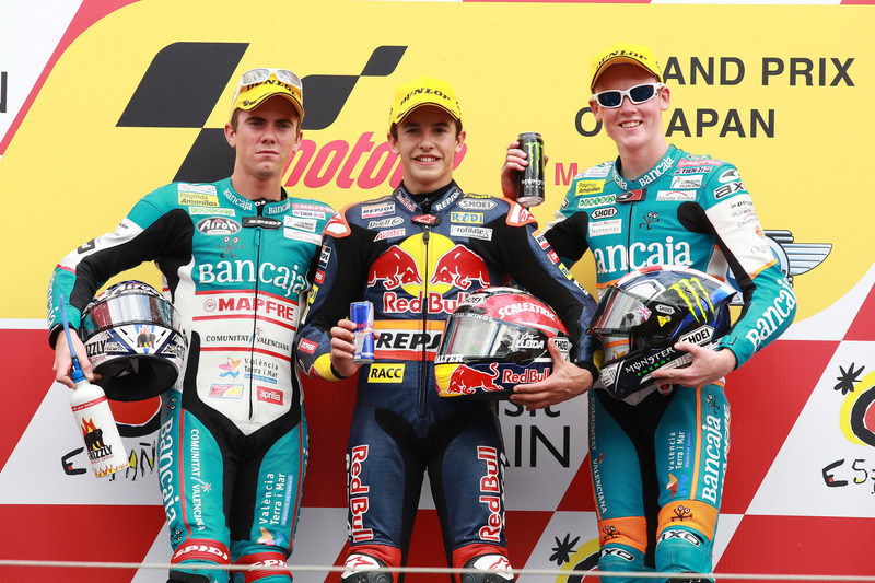 Podio: segundo lugar Nicolás Terol, ganador de la carrera Marc Márquez, tercer lugar Bradley Smith