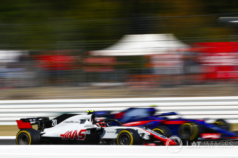 Kevin Magnussen, Haas F1 Team VF-18, and Pierre Gasly, Toro Rosso STR13
