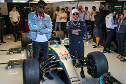 Usain Bolt, Lewis Hamilton, Mercedes AMG F1in the Mercedes AMG F1 garage