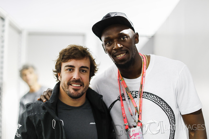 Fernando Alonso, McLaren, with Usain Bolt