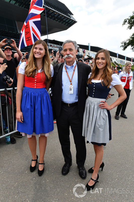 Chase Carey, Chief Executive Officer and Executive Chairman of the Formula One Group and girls