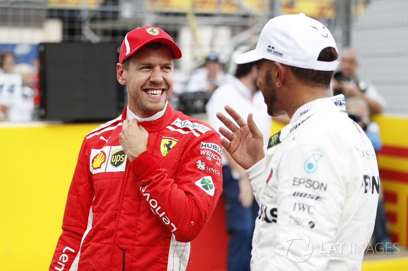 Sebastian Vettel dan Lewis Hamilton