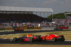 Kimi Raikkonen, Ferrari SH71H and Max Verstappen, Red Bull Racing RB14