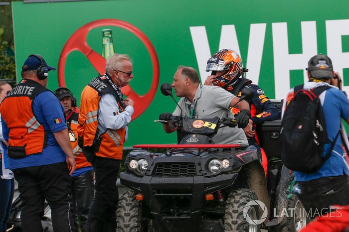 Race retiree Max Verstappen, Red Bull Racing, Race Marshals and Security after stopping on track