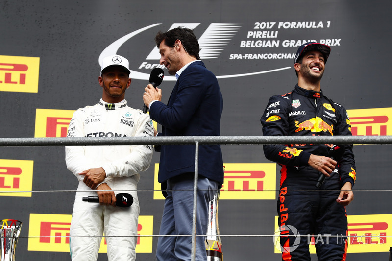 Podium: Mark Webber, Channel 4 F1, interviews race winner Lewis Hamilton, Mercedes AMG F1