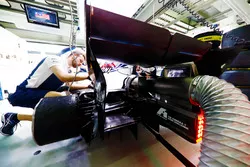 A Williams engineer at work in the garage