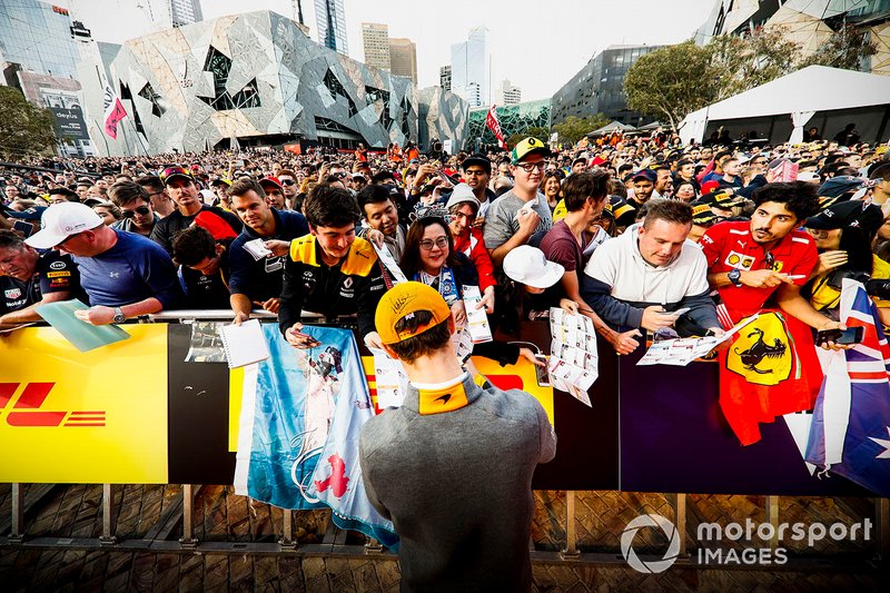 Lando Norris, McLaren signs a autograph for fans at the Federation Square event