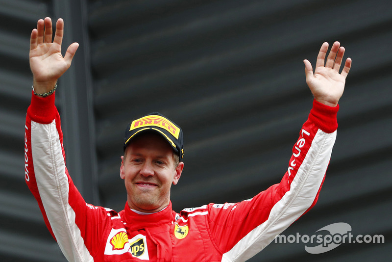 Il vincitore della gara Sebastian Vettel, Ferrari