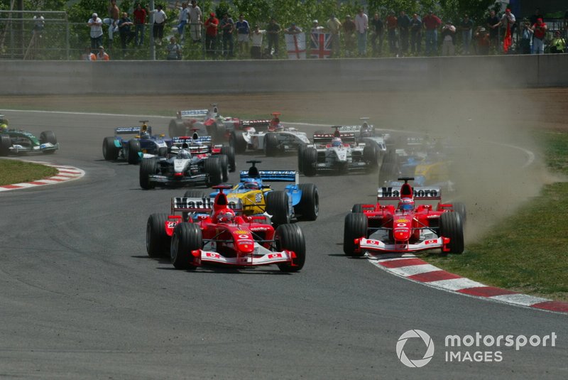 Michael Schumacher, Ferrari F2003-GA leads the start